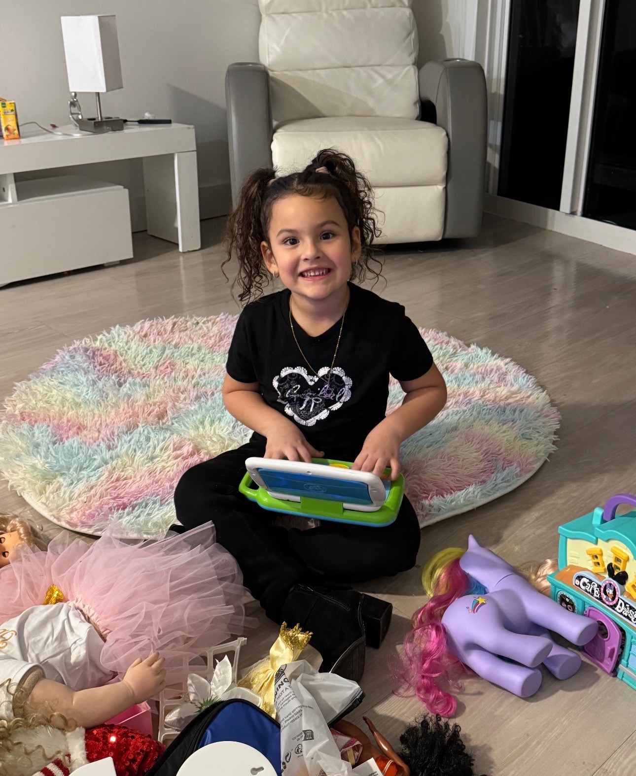 Child playing with learning toys during a home therapy session in Miami